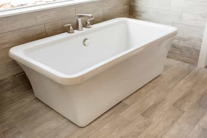 A square shaped luxury soaking bathtub installation for Glendale, California home