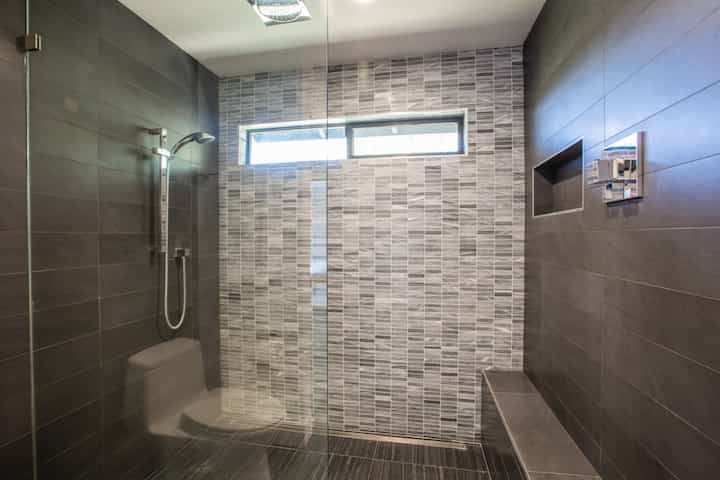 A home in Glendale, California received a wine colored shower installation